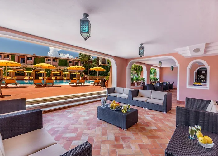 منتجع Villaggio Cala Ginepro & أروسييْ